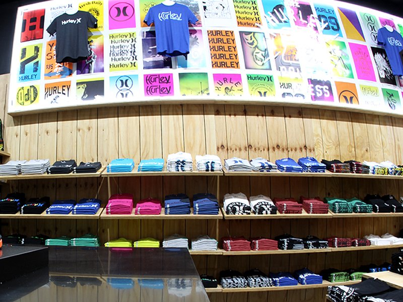 Wall-mounted fabric wall frame with seamless SEG graphics for interior branding.

