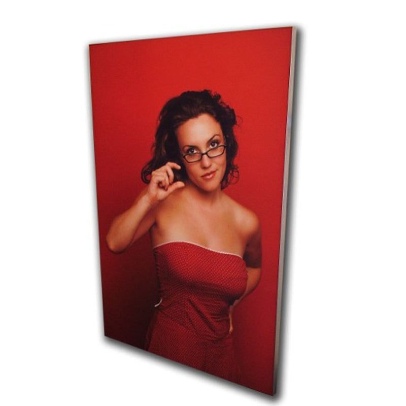 Wall-mounted fabric wall frame with seamless SEG graphics for interior branding.
